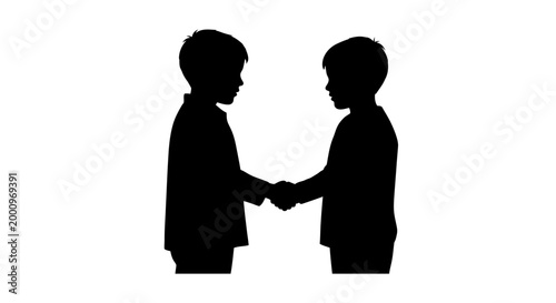Silhouette of two boys shaking hands representing friendship and agreement.