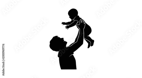 Silhouette of a father lifting his baby high in the air.