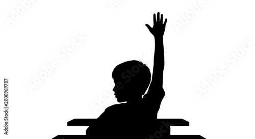Silhouette of a school child raising their hand in a classroom setting.