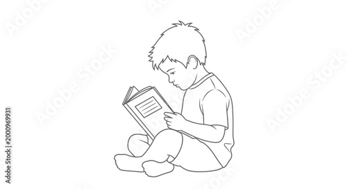 A young boy sitting on the floor reading a book.