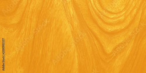 A natural dark oak hardwood floor design features a textured brown wood grain pattern on a weathered timber plank board surface for a rustic material wallpaper background. Golden yellow wood grain