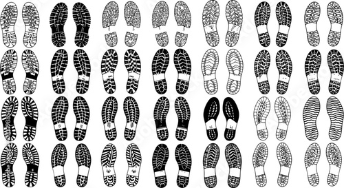 Set of black shoe sole prints isolated on white background for footwear design and forensic tracking concepts