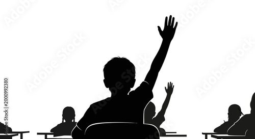 Silhouette of a student raising hand in classroom.