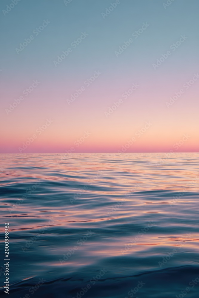Obraz premium Calm, tranquil ocean sunset. Blurry water, soft pastel sky colors