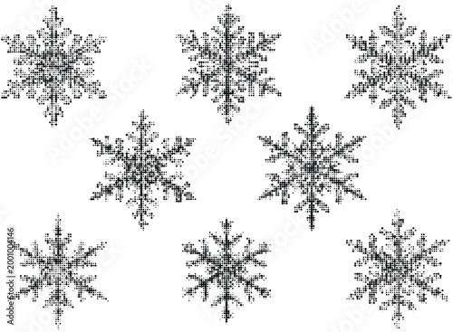 Scattered snowflakes in grayscale halftone effect overlayed on transparent checkered background winter.