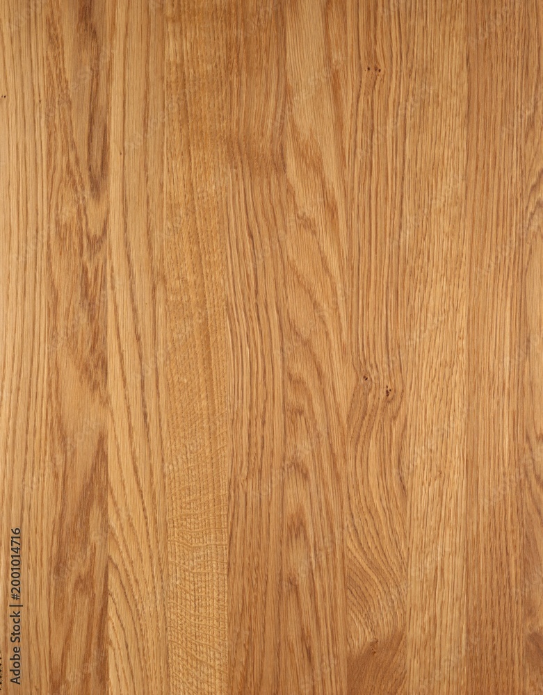 Fototapeta premium Oiled solid oak board with warm honey golden tones, prominent vertical grain and visible medullary rays, premium hardwood surface.