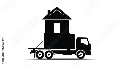Black silhouette of moving truck with house on flatbed, relocation and transportation concept