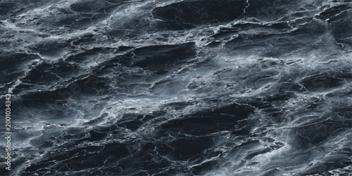 A mesmerizing view of the swirling water with abstract waves, captured from above, creating an engaging pattern and inviting a sense of wonder. 