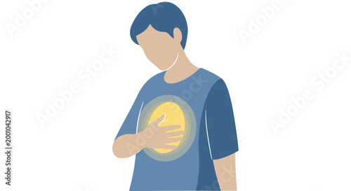 A man in a blue t-shirt holding his sore stomach
