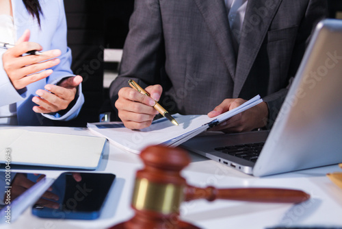 Quadro su tela Consultation and conference of professional businesswoman and Male lawyers working and discussion having at law firm in office