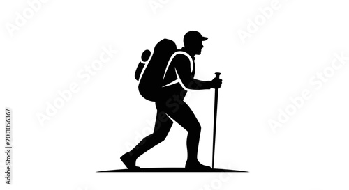 Silhouette of a hiker with backpack and trekking poles on a minimalist landscape
