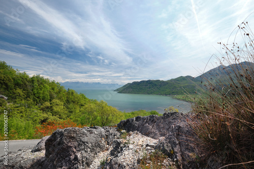 Skadar Lake Rumija mountain ridge with spring vegetation and flowing cloud formations
