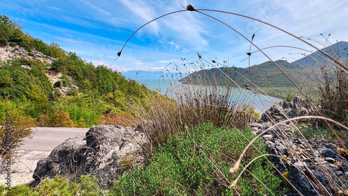 Skadar Lake view from Montenegro mountain ridge with spring vegetation and sky
