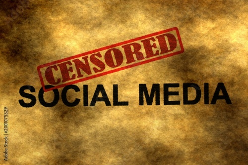 Censored Social Media Concept with Red Stamp on Textured Background