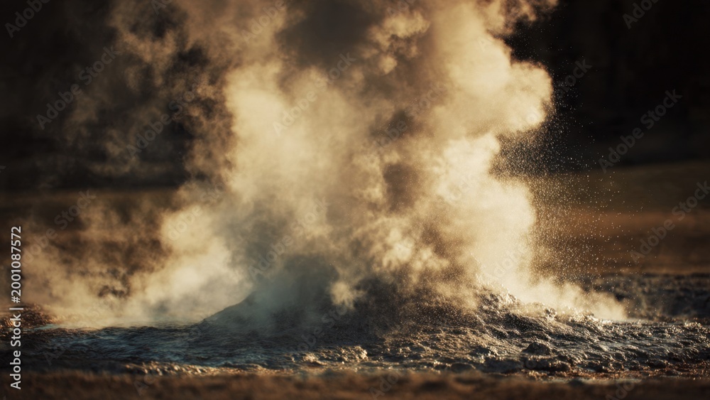 Fototapeta premium Steam Erupting from Hot Spring at Sunset