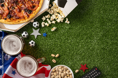Fotografía Football championship viewing party with pizza, beer, snacks and American flag o