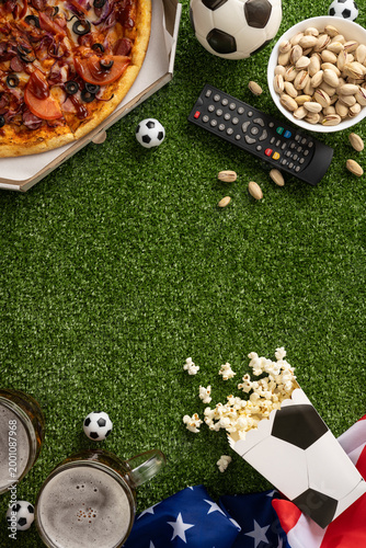 Konstfotografi Football championship vertical viewing with snacks and drinks on turf featuring