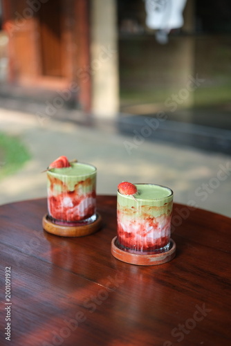 Matcha Strawberry Latte Drinks in Glasses on Wooden Table, Refreshing Beverage