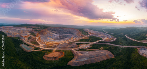 Schilderij op canvas Stunning aerial view of expansive open pit mine in scenic industry panorama land