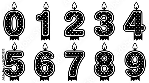Set of black number birthday candles with white polka dots