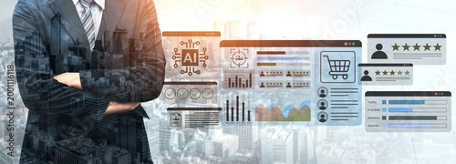 Photos Professional businessman stands confidently with digital data visuals around him, showcasing analytics and technology elements for informed decision-making in a modern business environment