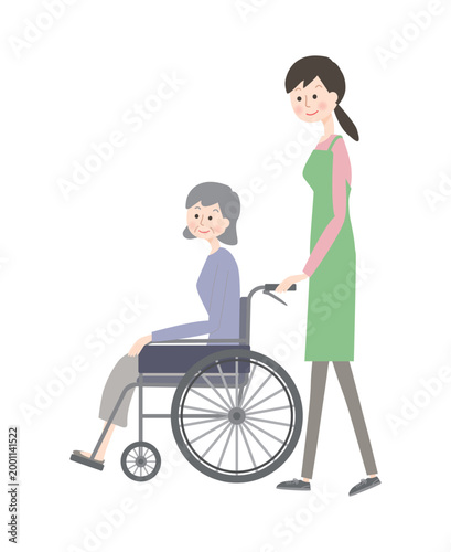 車椅子のシニア女性と介護スタッフ