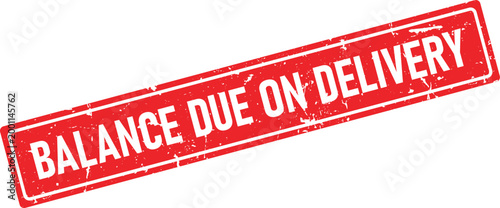 BALANCE DUE ON DELIVERY red ink rubber stamp imprint angled on a white surface