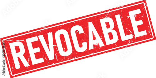 Red ink stamp impression with the word Revocable in white distressed lettering on a white background