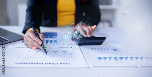 Fotografie Business doing finances and calculating financial report with business graph growth chart, finance and investment Business Financing Accounting Banking Concept