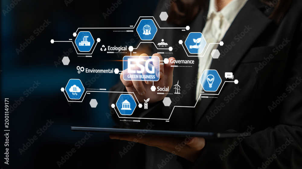 Obraz premium A business professional demonstrates ESG concepts focused on environmental, social, and governance themes, highlighting digital strategy and innovative solutions for sustainable growth. Tessel