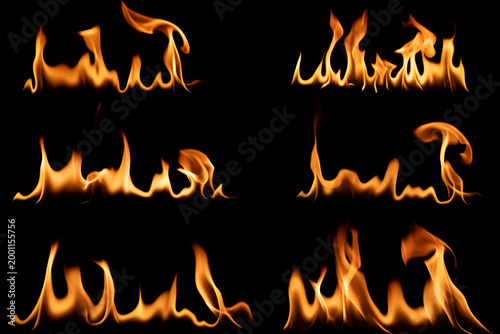 set of realistic fire flames isolated on black background for graphic design