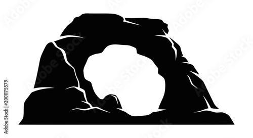 Black silhouette of rock formation.