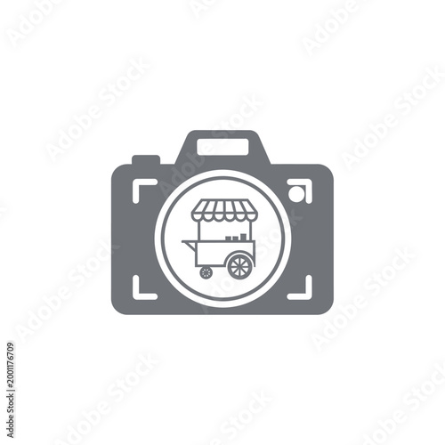 Food cart with awning on wheels.