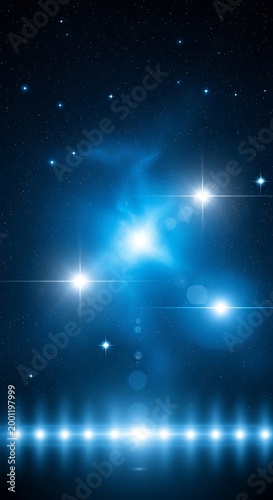 Glowing blue starry night sky with bright lights and celestial background