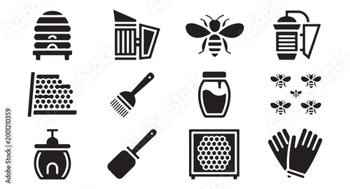 Honey harvesting tools and beekeeper accessories set featuring hives and extraction equipment.