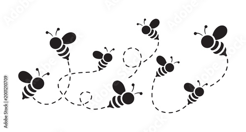 Honey bee flight path illustration with dashed line trails and cartoon bumblebees flying around.