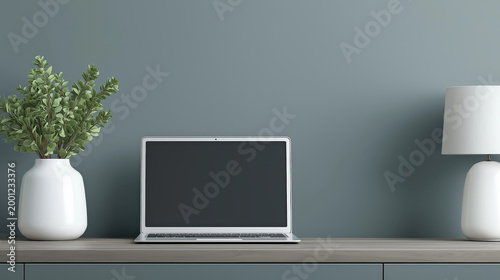 Laptop desk plant lamp modern minimalist home office calm modern laptop wooden desk with green plant and white lamp against