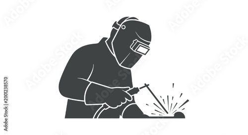 Welding Worker in Protective Gear Working.