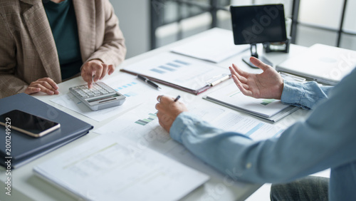 business man Auditor or internal revenue service staff checking annual financial statements company Audit  Accounting tax.