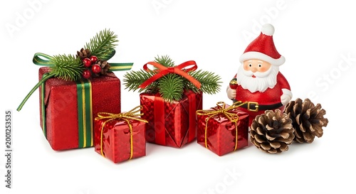 Christmas gifts and Santa Claus figurine with pine cones and spruce branches on white background, festive holiday winter season theme, advertising