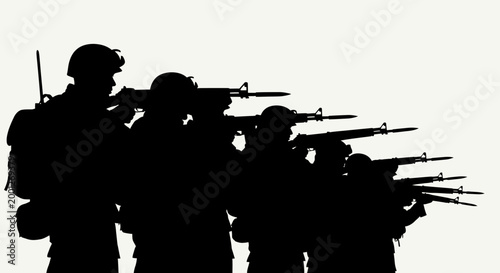 Silhouette of soldiers in formation with rifles, ready for action