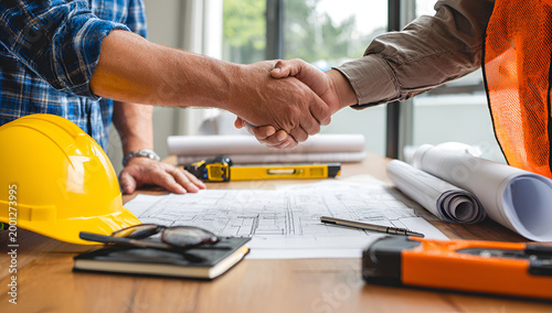 Construction Business Deal Handshake Between Two Engineers.