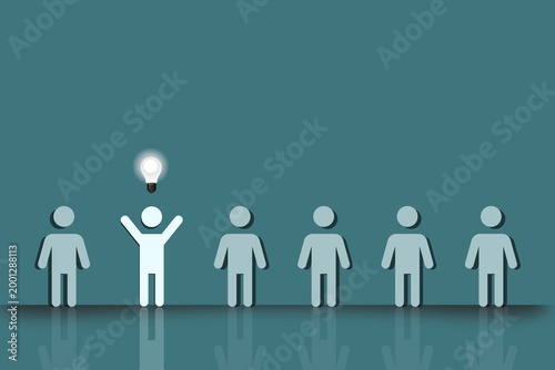 Cuadro en lienzo Leadership and innovation concept with standout figure under light bulb among gr