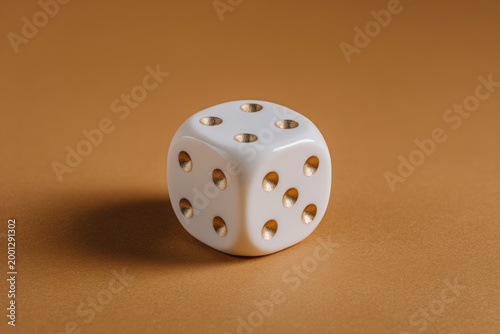 White die on tan background (1)