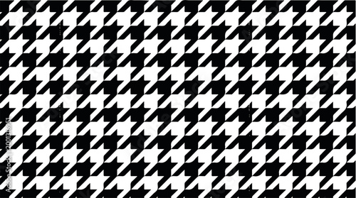 A classic black and white houndstooth pattern, a timeless and versatile geometric design, perfect for fashion and home decor applications