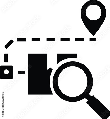 Magnifying Glass Examining Location Marker on Map