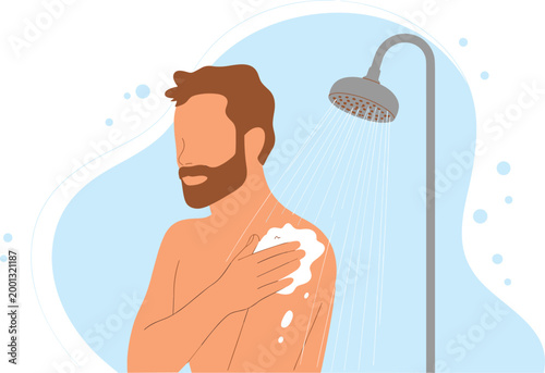 Bearded man taking a refreshing morning shower with soap suds under running water for personal hygiene and grooming