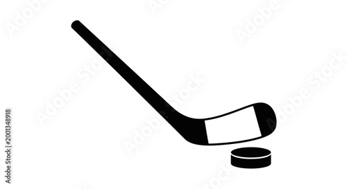 A hockey stick and puck on a white background