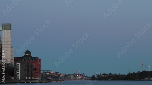 Stockholm, Sweden A sunrise view of the Kvarnholmen district and city skyline. 