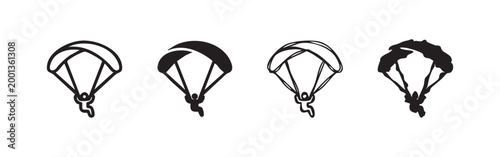 Four paragliding icons in different styles